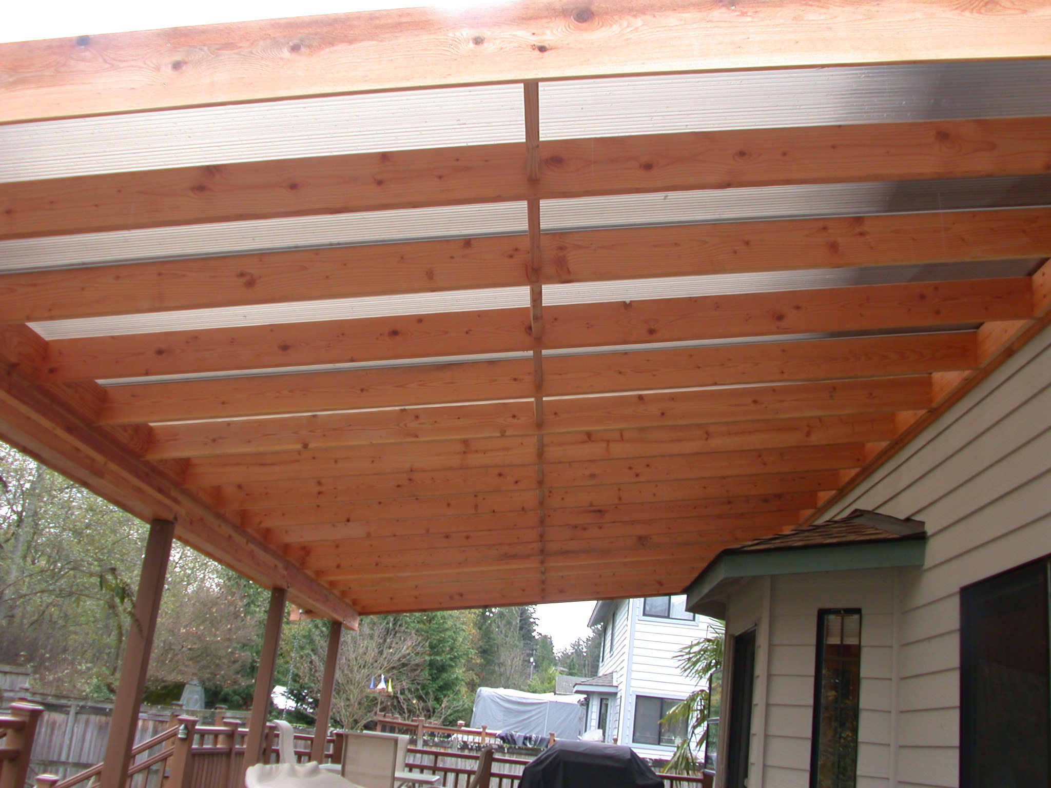 The roof of the patio cover is made of dual panel polycarbonate 